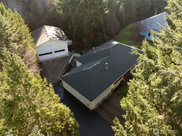 Aerial view of home and shop.
