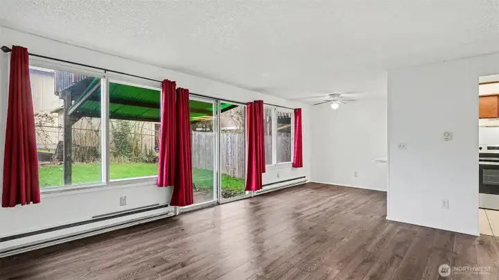 Living rm leads to patio & yard