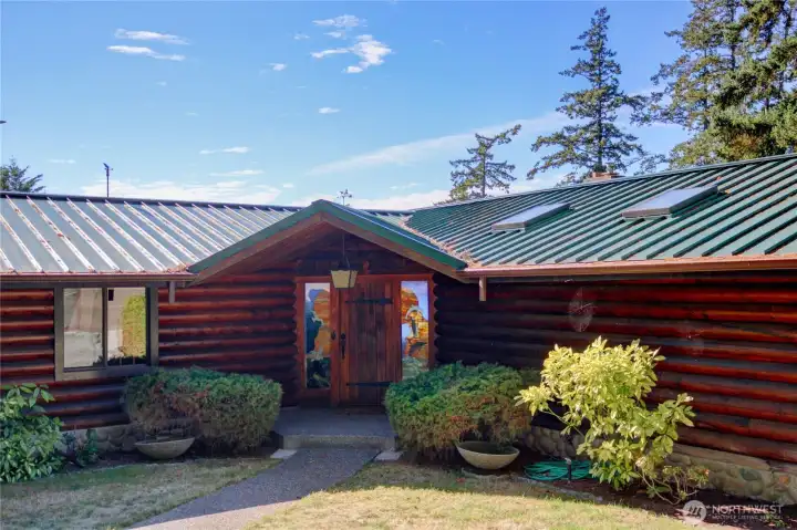Nicely landscaped front entry.
