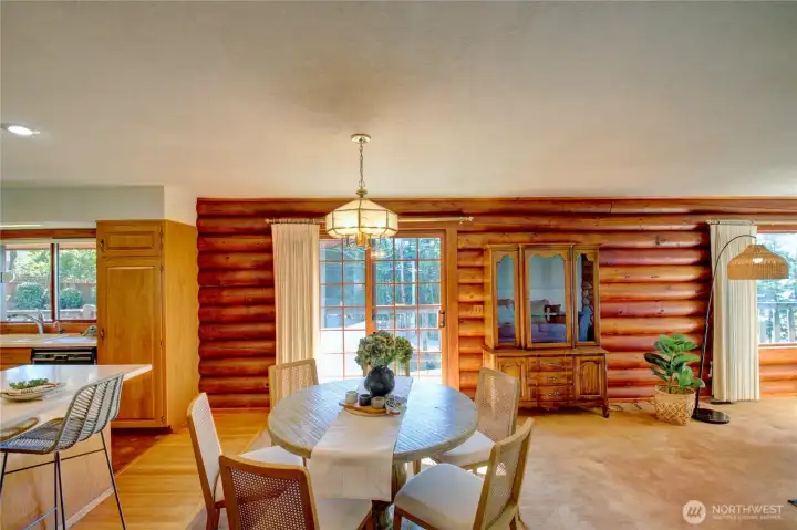 Dining room with slider to balcony.