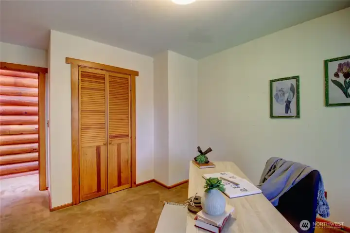 Second bedroom closet and looking out to hallway.