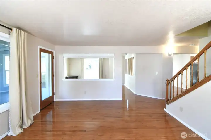 family room leading to Sunroom on left