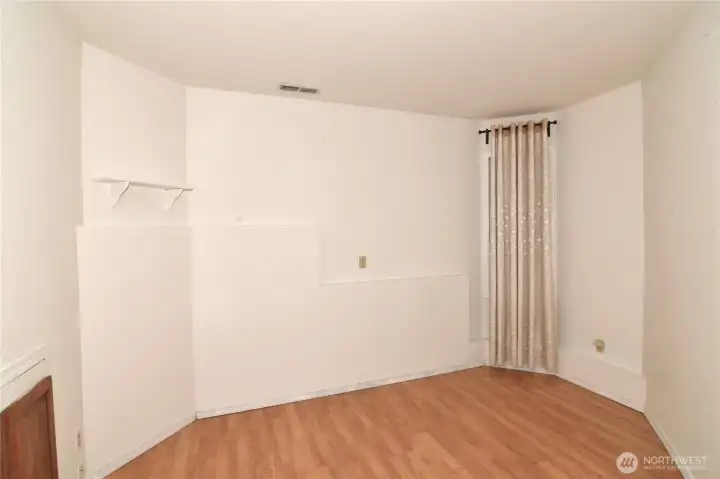 versatile basement with window for den or office space
