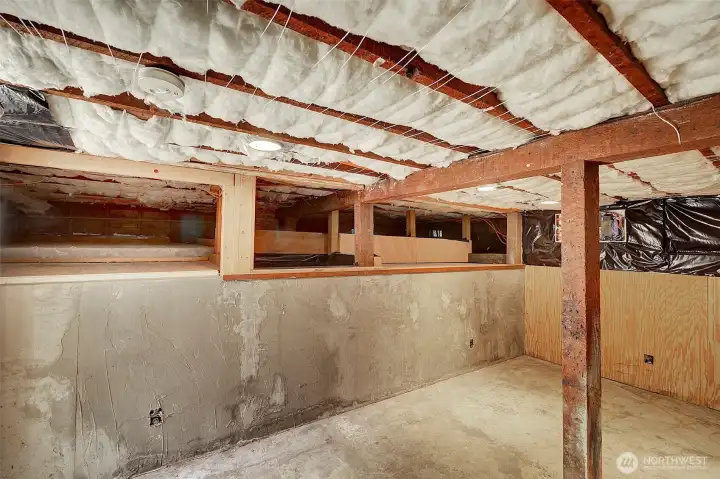 Completely refreshed crawl space and spacious basement w/outdoor access