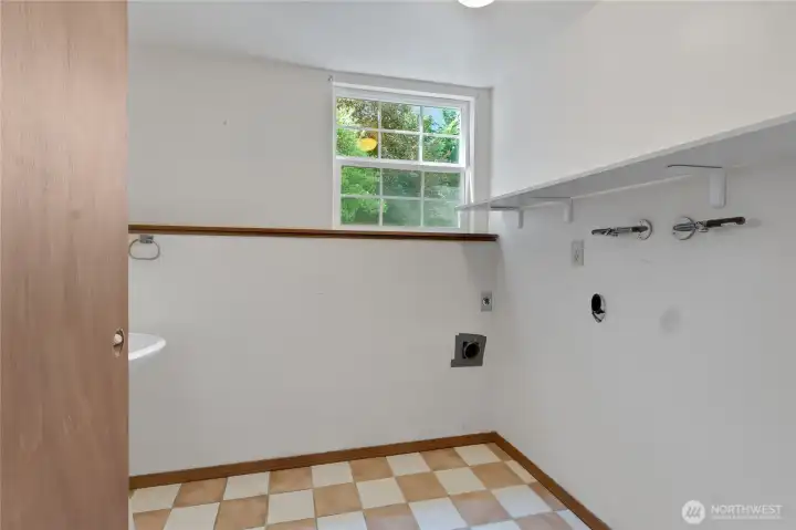 Laundry room - has 1/2 bath to left of the door