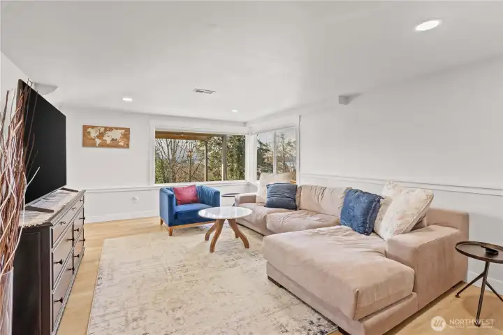Lower level rec room mirrors the living room with view as well