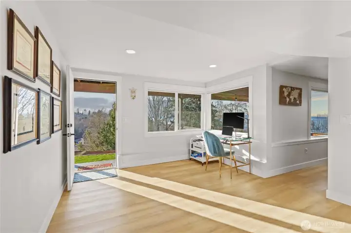 Open to the lower level yard and patio, this is the perfect work from home space