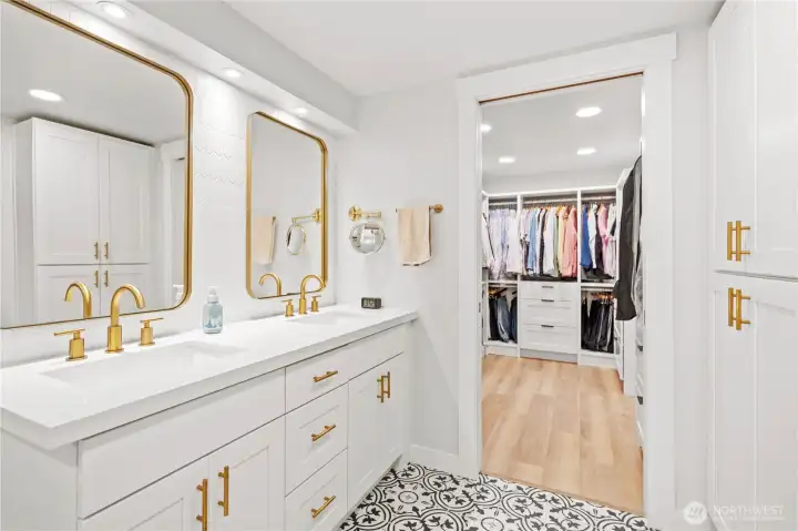 Dual sinks and a custom walk in closet
