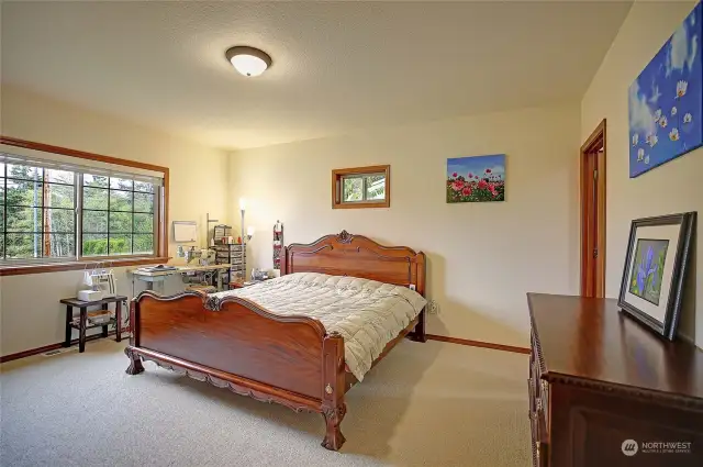 Spacious primary bedroom with ensuite and walk-in closet