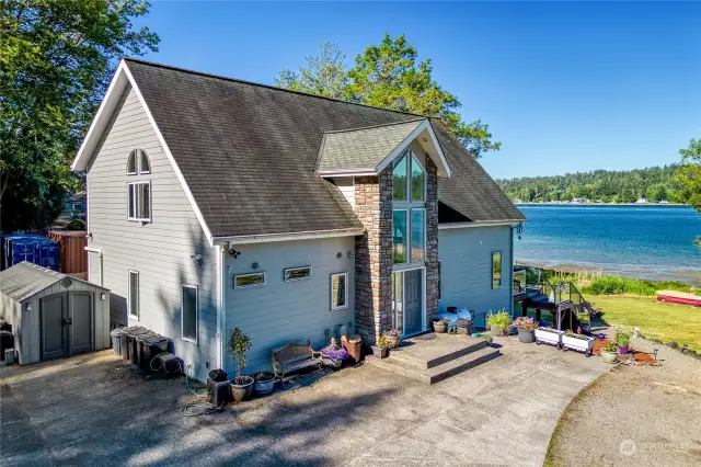 A spacious home on accessible waterfront is difficult to find. This solidly built 2007 home has a second kitchen on the lower level with a private entrance, which provides an opportunity for generational living. The 157 feet of private beach is ideal for kayaking, clamming, or beachcombing.
