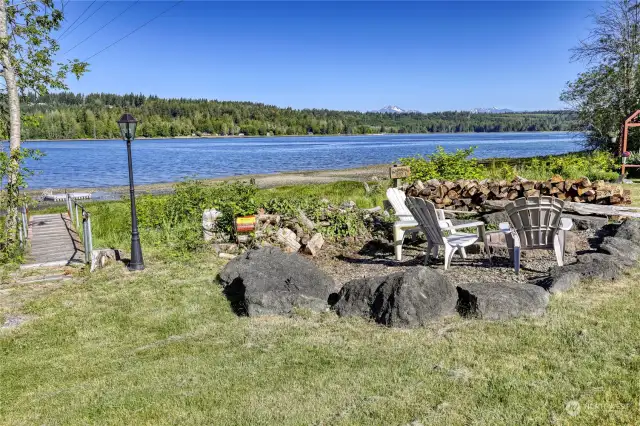 The beachside firepit is a great place to enjoy the views, with the walkway to the beach on the left.  What a beautiful view of the Case Inlet and the Olympic Mountains.