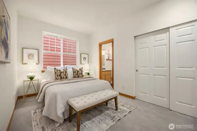 Another look at the primary bedroom with lots of closet space.
