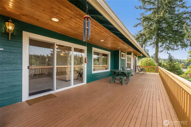 Step outside and take in the beauty of your surroundings from the full-length deck—ideal for summer barbecues, morning yoga, or simply soaking in the peaceful view.