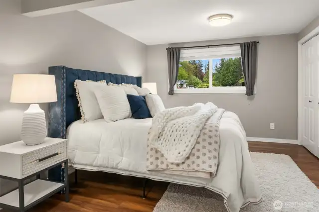 Bedroom downstairs - high ceilings, lots of closet space, and a separate work area/bonus space (separate from downstairs living room)