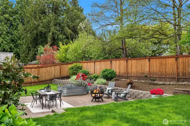 Fully-fenced, level yard with gate access on both sides.