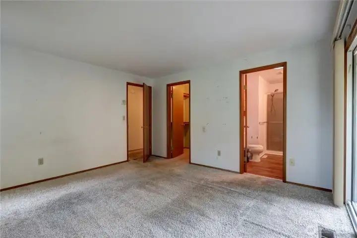 Primary bedroom with bathroom and walk in closet.