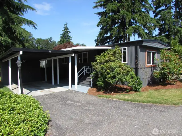 COVERED PARKING AND MORE, FRESH EXTERIOR PAINT & ROOF UPDATED.