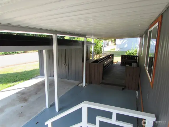 COVERED AREA AS SEEN FROM FRONT PORCH OF HOME.