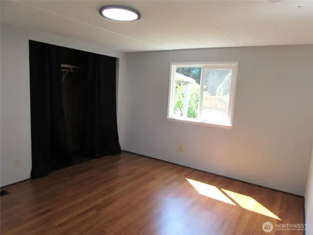 NEW LIGHTING AND PAINT, CLOSET IN PRIMARY BEDROOM.