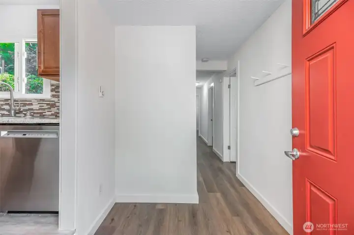 Hallway to more bedrooms
