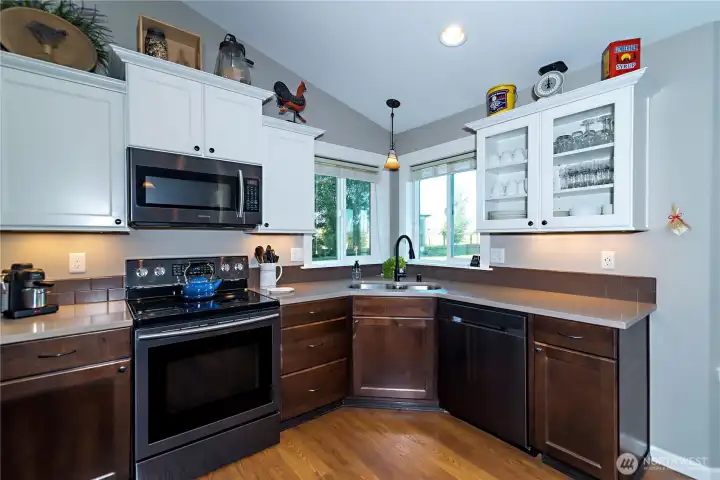 Corner set sink provides views and natural light.