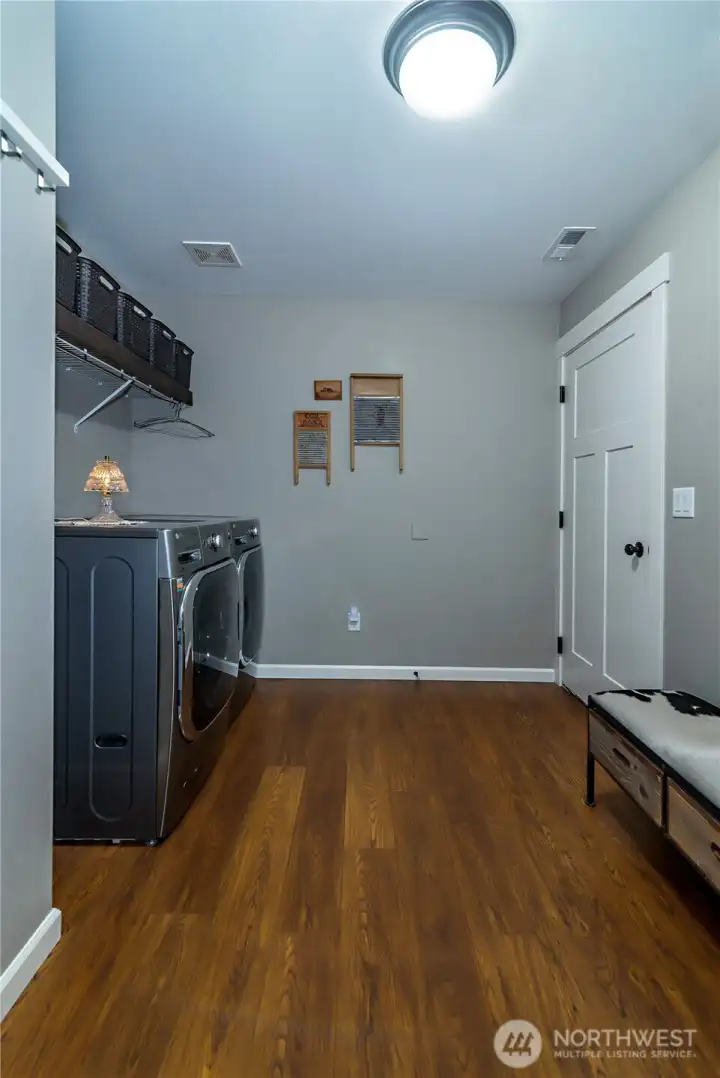 Laundry room leading into the garage is exceptionally large.