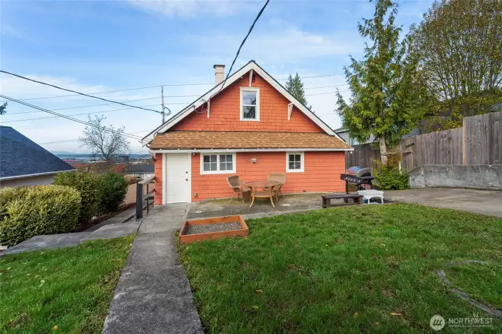 A view of the back of the house - fully fenced large backyard