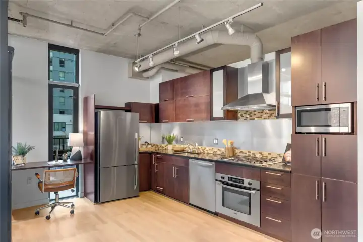 A perfect kitchen. Quality wood cabinets.