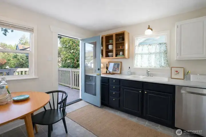 Part Ballard hip and part Grandma Chic. Spacious and opens up to the large deck and backyard!