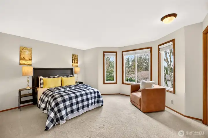 Spacious secondary bedroom with soft carpet and a simple, flexible layout that works well as a guest room, home office, or hobby space. Plenty of wall space for storage pieces.