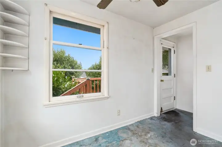 Kitchen, looking toward door to backyard deck