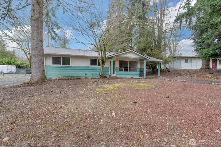 Front of home, Large lot! Huge garage/shop out back!