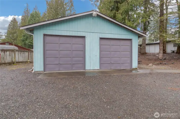 Large 890 SqFt garage/shop with 2 rooms inside of it.