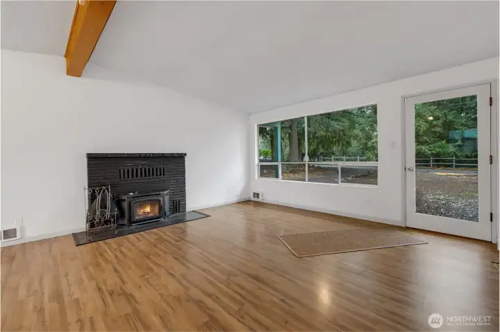 Living area with fireplace and vaulted ceilings