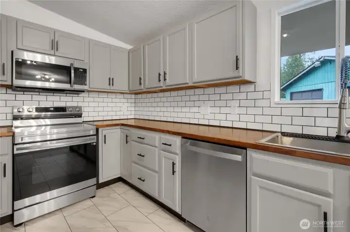 Beautiful kitchen with stainless appliances