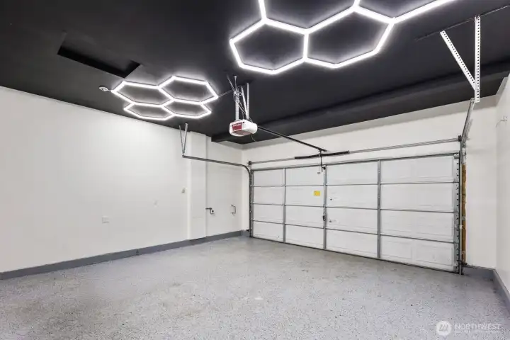 epoxy flooring, updated lighting new paint, EV Charger