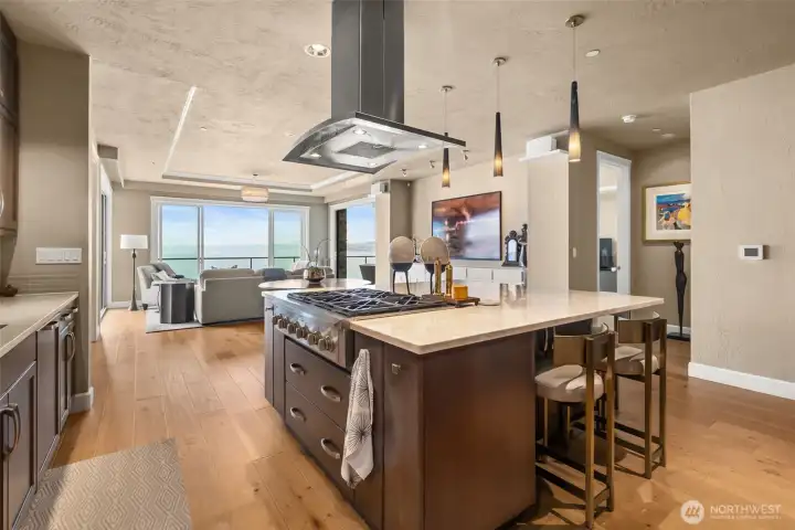 Large island offers extra seating on 3 sides