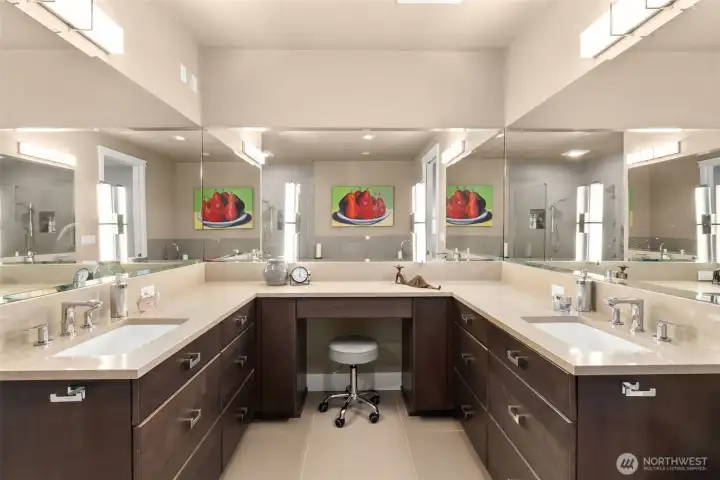 Dual sinks + vanity provide plenty of space to get ready in the morning