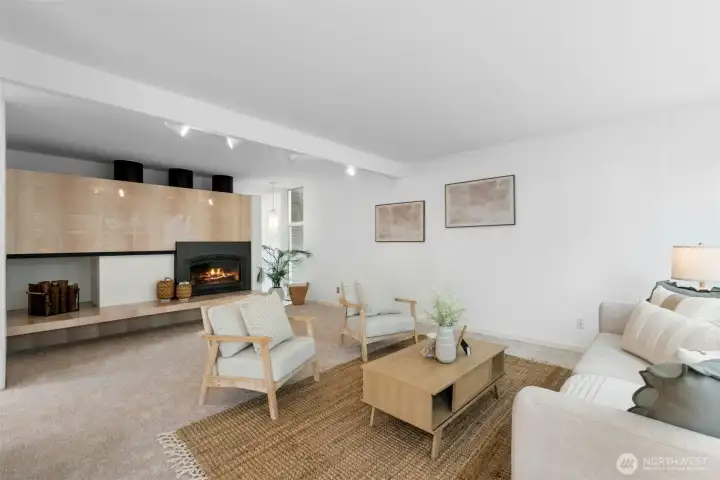 Light-filled living room with gas fireplace