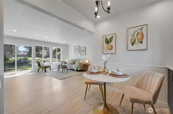Dining room and living room, showing sliding glass door to the back yard and patio