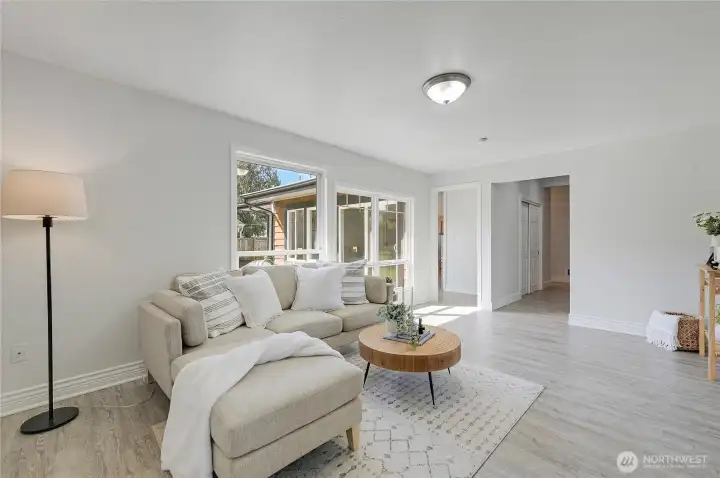 Familyroom doorway on the right leads to a hallway with large storage closet, doorway on left leads to Living room