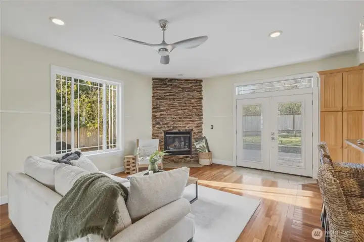 The family room is light and bright and faces the backyard for added privacy and easy access to backyard BBQ's or letting a dog in and out.