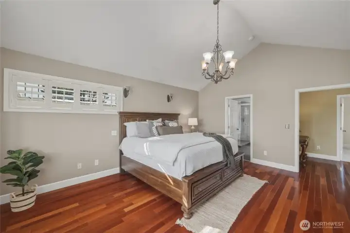 Elegant primary suite with en-suite bathroom and oversized walk-in closet.