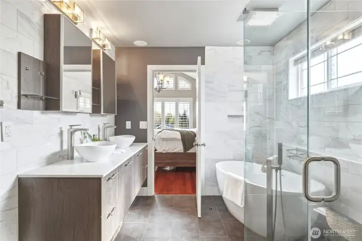 Gorgeous , spa-like 5 piece bathroom with double sinks, a walk-in shower and a large soaking tub.