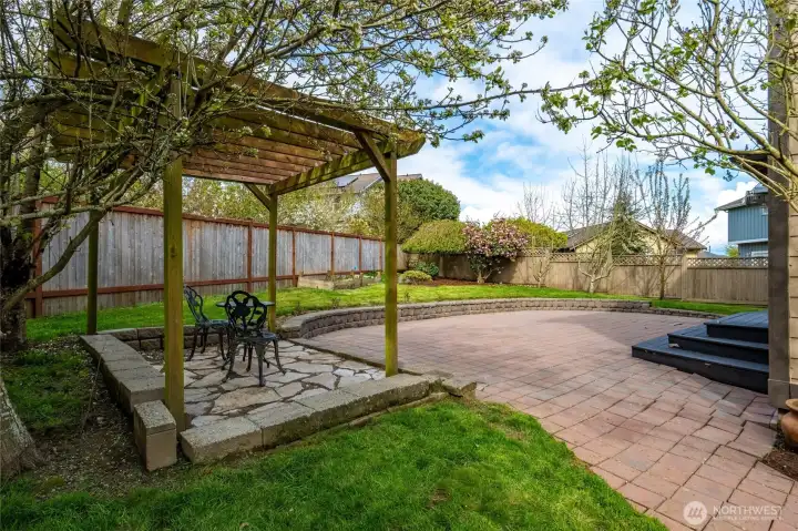 Newer fence on East and North side of the property. Beautiful mature landscaping and so much room to relax or entertain.