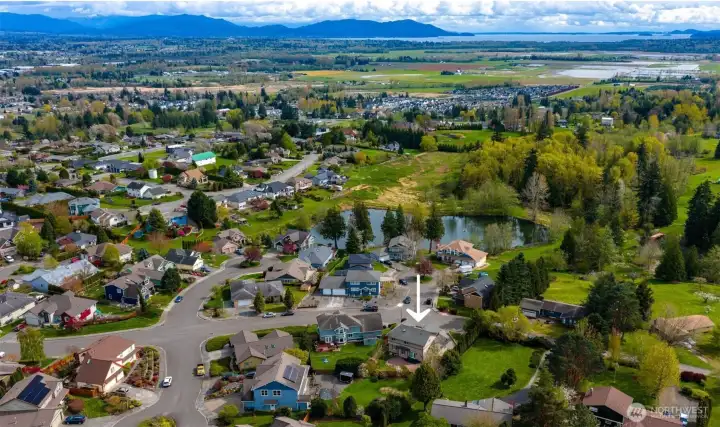 And you'll love the neighborhood lake and trail which is located just across the street! This lake is great for bird watching and fishing! Access located in the culd-a-sac right below. With easy access to Bellingham Bay, Mt. Baker and all the PNW has offer!