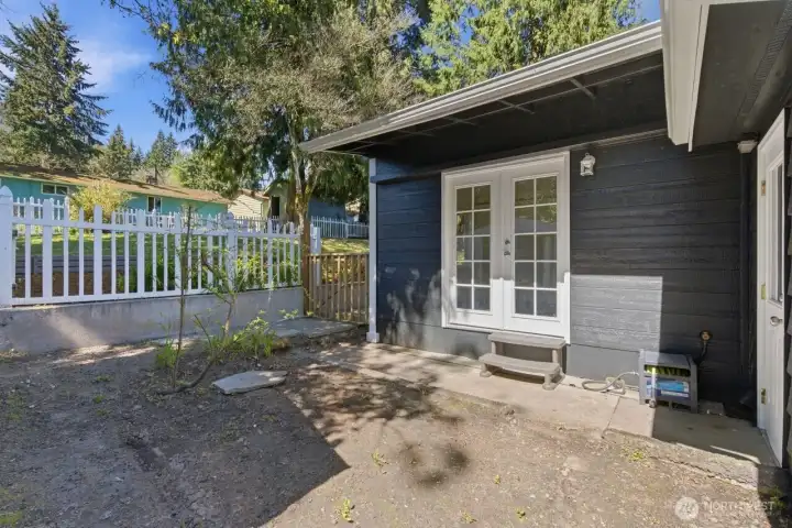 Dining room french door & side/back yard.