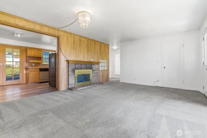 Living room view into kitchen.