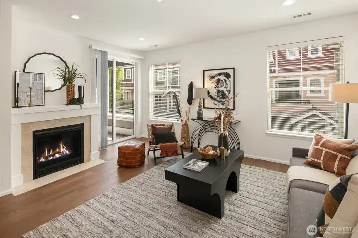 Spacious living room with cozy firefpace and flexible layout options