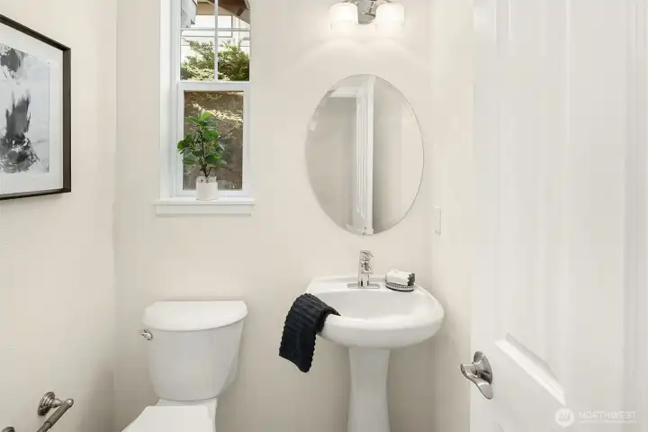 Powder room on main floor for guests and yourself.